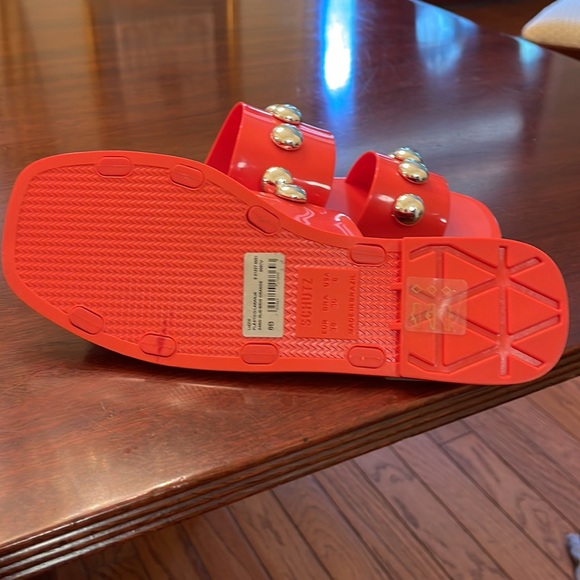 Schutz Red Slide Sandals with Gold Accents - Picture 4 of 6